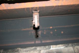 I cannot remove the handle from my fireplace damper