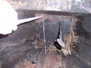 The fireplace flue walls slant under my damper, where do I put the Chimney Balloon?